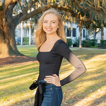 Portrait of Sevin Murdock, Realtor®.